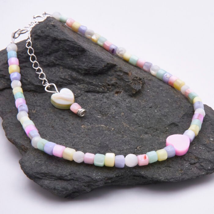 Mother of Pearl Heart Anklet Mother of Pearl Heart Anklet shown on dark grey stone