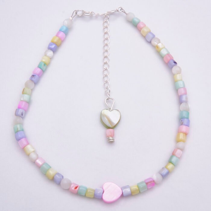 Mother of Pearl Anklet with Sterling Silver clasp and extender chain Mother of Pearl Anklet with Sterling Silver spring ring clasp and extender chain shown from above on plain white background
