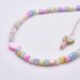 Mother of Pearl Heart Anklet Mother of Pearl Heart Anklet close up of beads and hearts on plain white surface