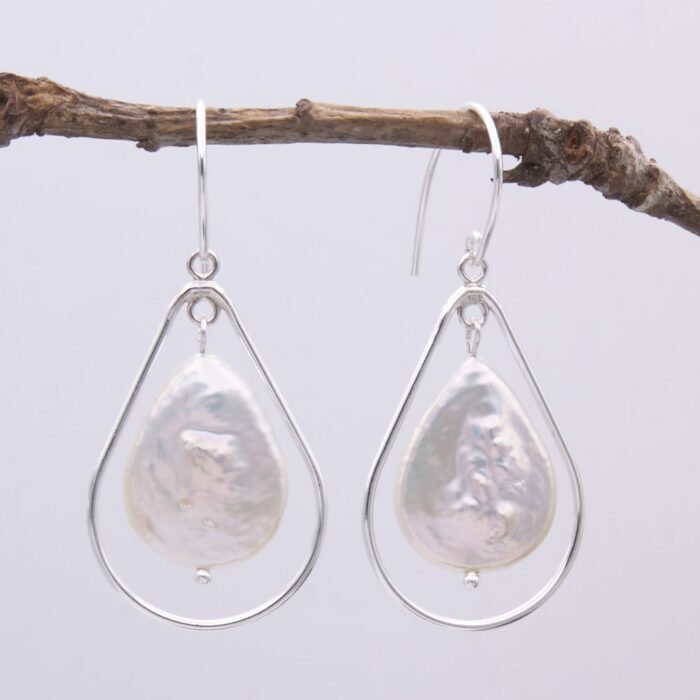Front of Freshwater Pearl Pears and Sterling Silver Earrings hanging
