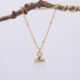 Opalite Gold Plated Necklace hanging from twig