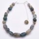 Moss Agate and Labradorite Sterling Silver Bracelet with extender chain, shown from above on flat white surface