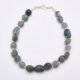 Moss Agate and Labradorite Sterling Silver Bracelet with Lobster Clasp Moss Agate and Labradorite Sterling Silver Bracelet with Lobster Clasp shown from above on flat white surface