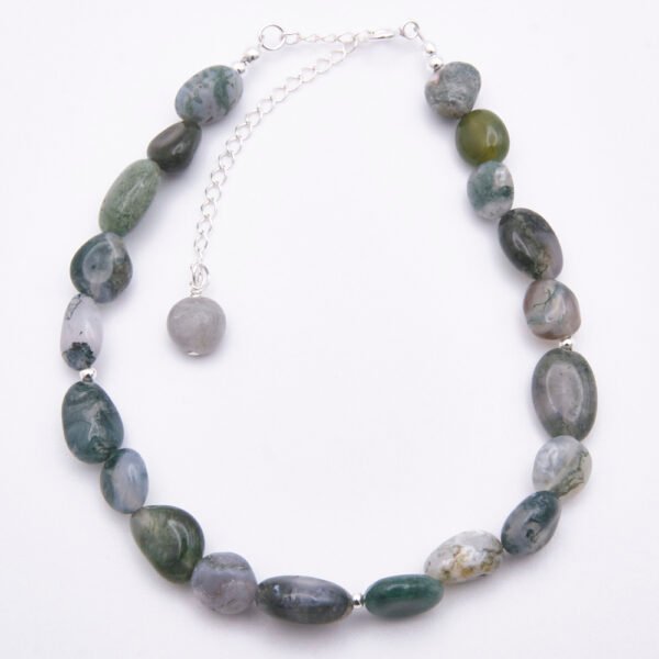 Moss Agate Sterling Silver Bracelet with Extender Chain and Labradorite wire-wrapped bead trim, shown from above on plain white surface