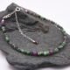 Ruby Zoisite Sterling Silver Bracelet with faceted round Ruby Zoisite beads interspersed with sterling silver flat spacers and finished with a sterling silver spring ring clasp and extender chain with ruby bead trim