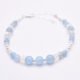 Aquamarine and Rainbow Moonstone Sterling Silver bracelet shown on flat white background