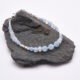 Aquamarine and Rainbow Moonstone Sterling Silver Bracelet on grey stone