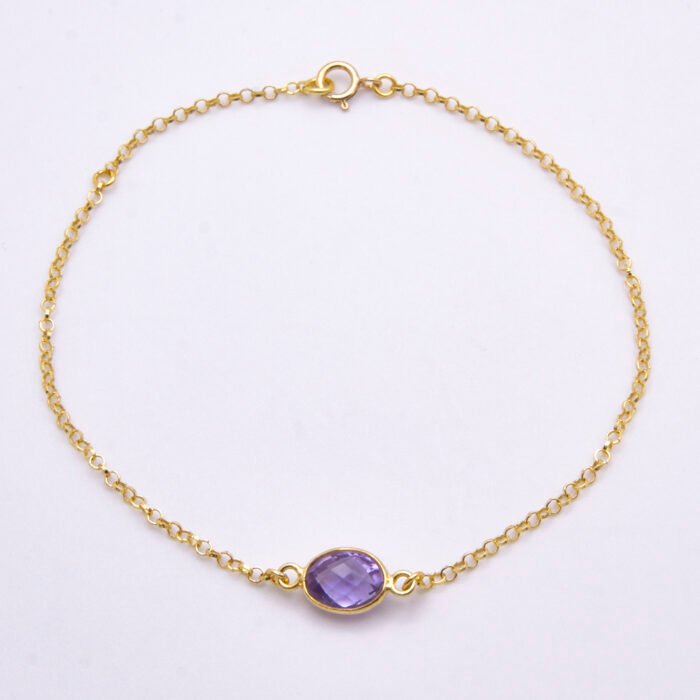 Amethyst 24k Gold Plated Sterling Silver Bracelet shown on flat white surface, viewed from above