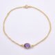 Amethyst 24k Gold Plated Sterling Silver Bracelet shown on flat white surface, viewed from above