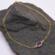 Amethyst 24k Gold Plated Sterling Silver Bracelet shown on dark grey stone