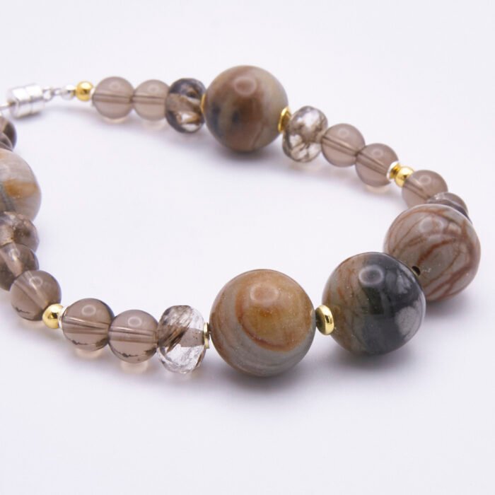 Picasso Jasper, Smoky Quartz and Watermelon Quartz Bracelet slightly closer shot on white surface