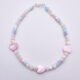 Mother of Pearl Heart Trio Bracelet shown from above on plain white background