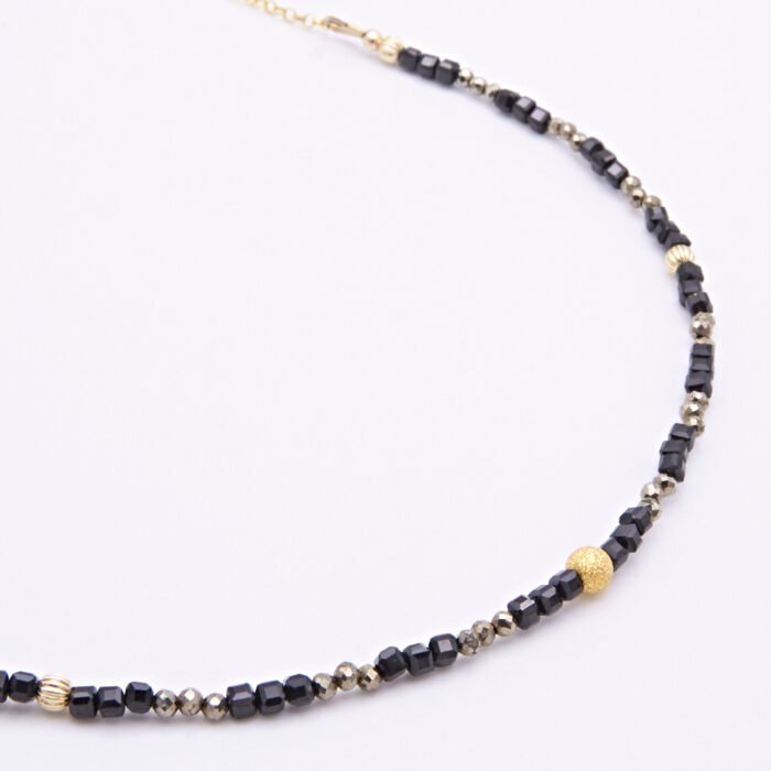 Black Spinel and Pyrite Gold Vermeil Necklace Close Up Black Spinel and Pyrite Gold Vermeil Necklace Close Up