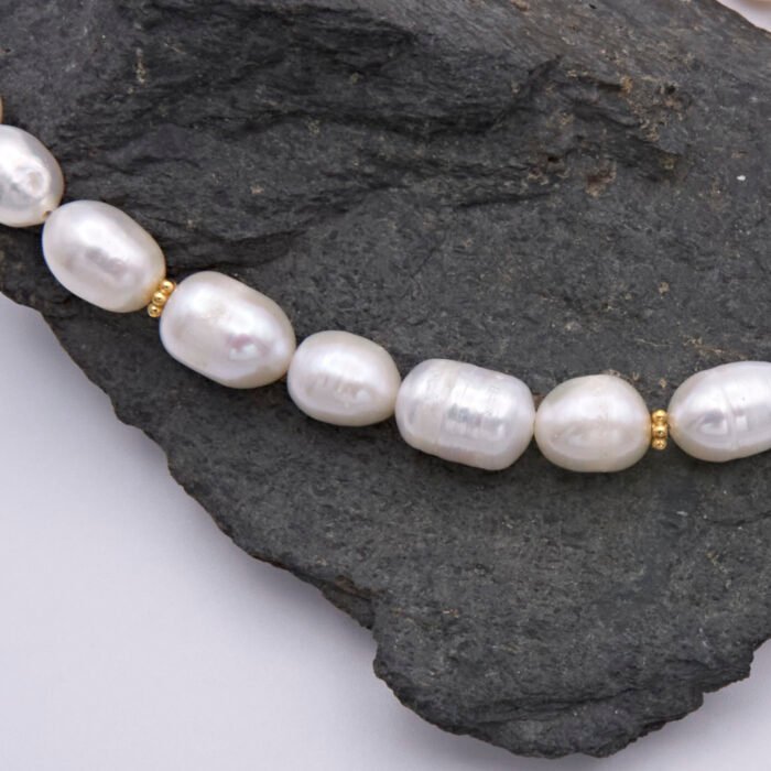Close up of section of Rustic Freshwater Pearl and Gold Necklace Close up of section of Rustic Freshwater Pearl and Gold Necklace