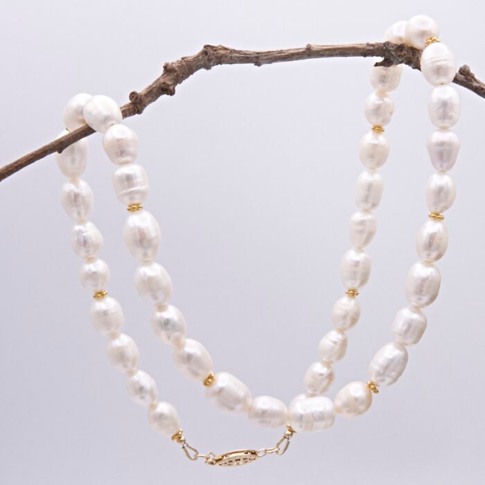 Rustic Freshwater Pearl and Gold Necklace Hanging Rustic Freshwater Pearl and Gold Necklace Hanging