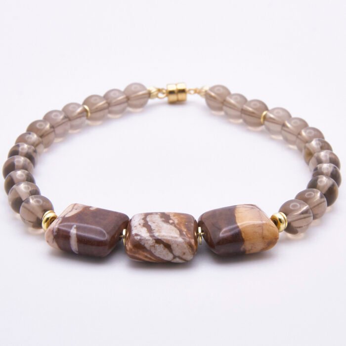 Zebra Jasper and Smoky Quartz Bracelet with Gold Filled Magnetic Clasp shown on plain white surface