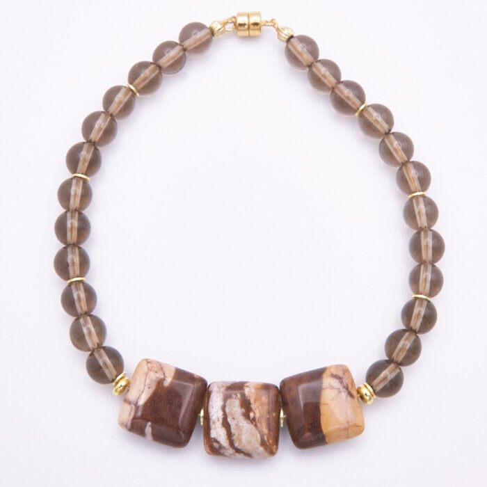 Zebra Jasper and Smoky Quartz Bracelet with Gold Filled Magnetic Clasp, shown from above on plain white surface