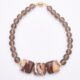Zebra Jasper and Smoky Quartz Bracelet with Gold Filled Magnetic Clasp, shown from above on plain white surface