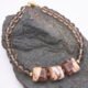 Zebra Jasper and Smoky Quartz Bracelet with Gold Filled Magnetic Clasp shown on dark grey stone