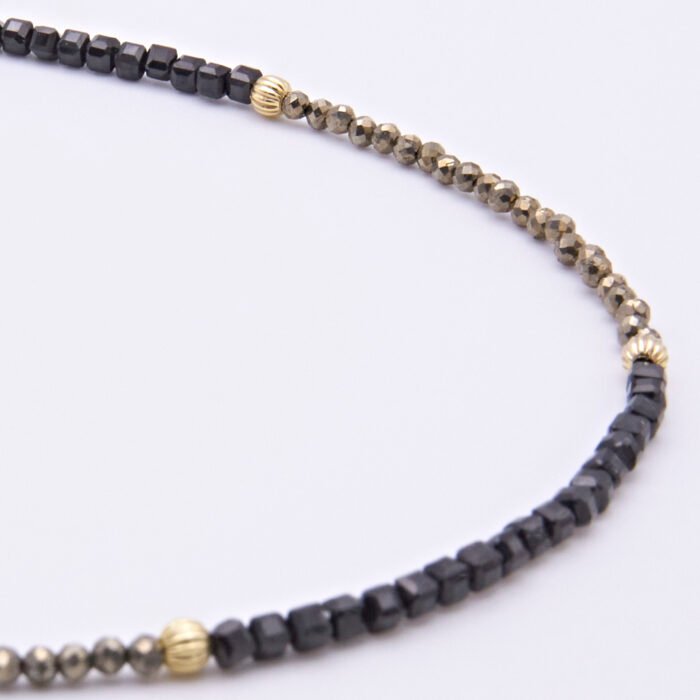 Black Spinel and Pyrite Necklace close up of beaded section of necklace