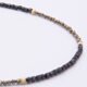 Black Spinel and Pyrite Necklace close up of beaded section of necklace