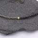 Black Spinel and Pyrite Necklace close up of Pyrite and Black Spinel beads with gold corrugated bead in centre