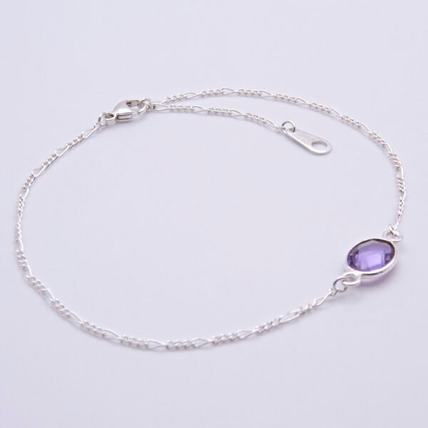 Sterling Silver Bezel-set Amethyst Bracelet shown on flat white surface