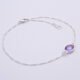 Sterling Silver Bezel-set Amethyst Bracelet shown on flat white surface