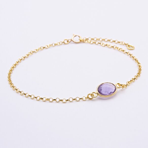 Amethyst and 24k Gold Plated Sterling Silver Bracelet shown on flat white surface