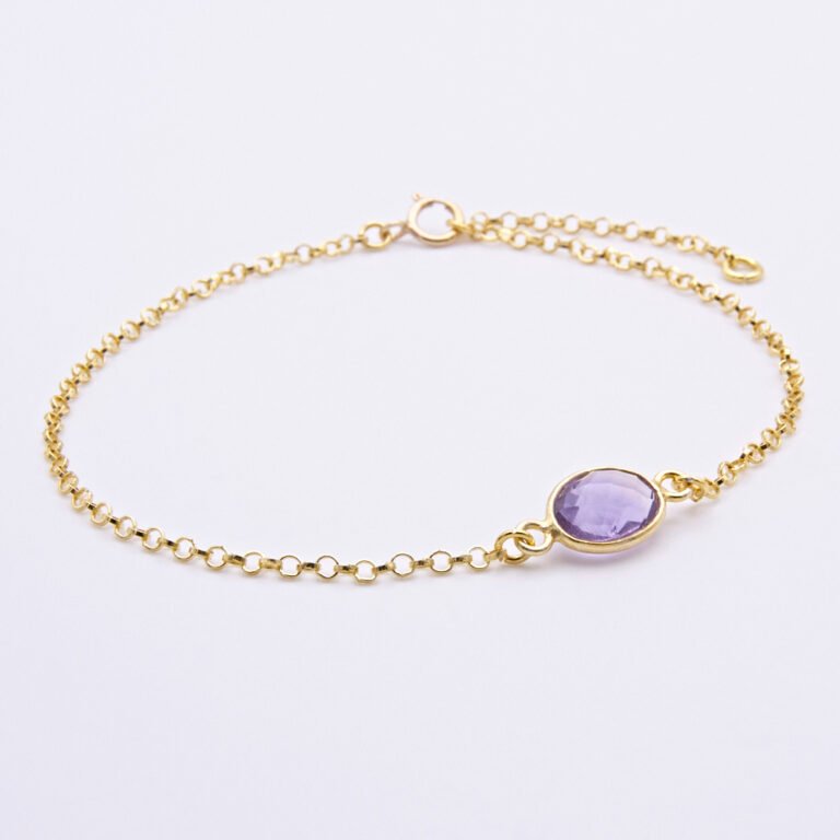Amethyst and 24k Gold Plated Sterling Silver Bracelet shown on flat white surface