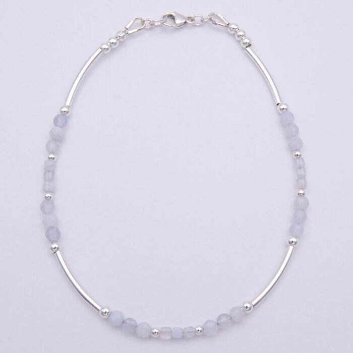 Blue Lace Agate and Sterling Silver Bracelet shown from above on flat white surface