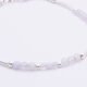 Blue Lace Agate and Sterling Silver Bracelet close up of beads on plain white surface