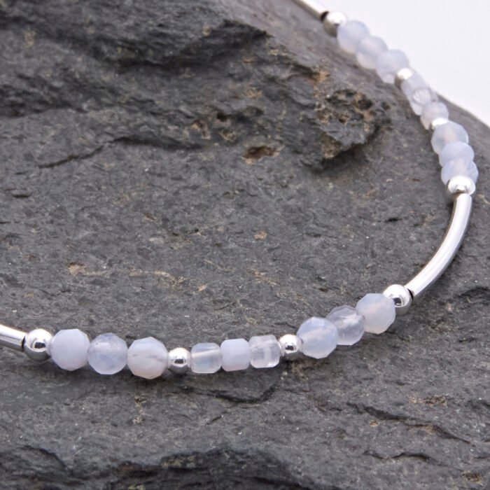Blue Lace Agate and Sterling Silver Bracelet showing close up of beads and dark grey stone