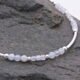 Blue Lace Agate and Sterling Silver Bracelet showing close up of beads and dark grey stone