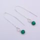 Emerald Sterling Silver Threader Earrings shown lying flat on a white background