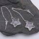 Crystal Quartz Rough Cut Chunky Star Threaders shown from above on dark grey stone