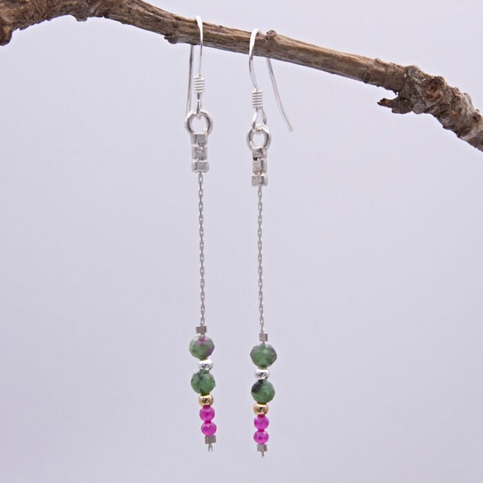 Ruby and Ruby Zoisite Sterling Silver Dangle Earrings shown hanging from twig