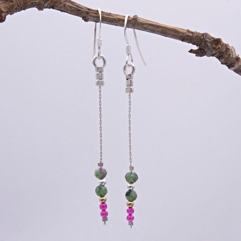 Ruby and Ruby Zoisite Sterling Silver Dangle Earrings shown hanging from twig