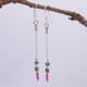 Ruby and Ruby Zoisite Sterling Silver Dangle Earrings shown hanging from twig