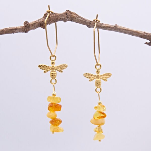 24k Gold Plated Sterling Silver Bee and Amber Hexagon Earrings shown hanging from twig