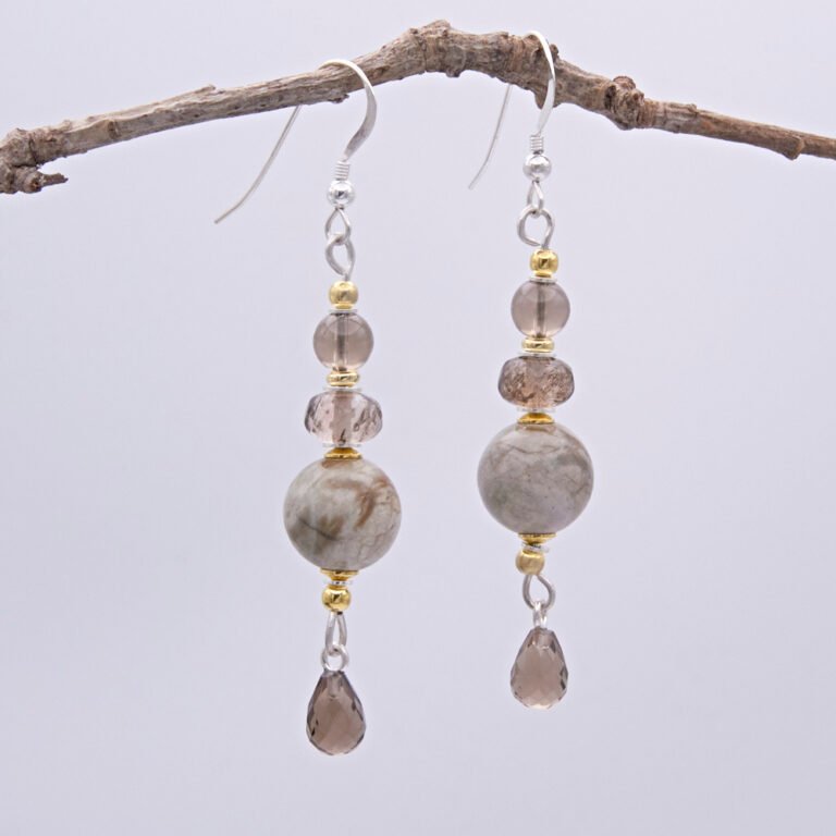 Picasso Jasper, Smoky Quartz and Smoky Watermelon Quartz mixed metals dangle earrings Picasso Jasper, Smoky Quartz and Smoky Watermelon Quartz mixed metals dangle earrings shwon hanging from twig