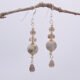 Picasso Jasper, Smoky Quartz and Smoky Watermelon Quartz mixed metals dangle earrings Picasso Jasper, Smoky Quartz and Smoky Watermelon Quartz mixed metals dangle earrings shwon hanging from twig