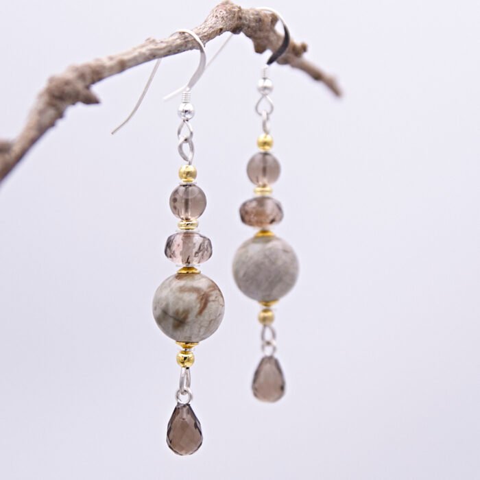 Picasso Jasper, Smoky Quartz and Smoky Watermelon Quartz mixed metals dangle earrings Picasso Jasper, Smoky Quartz and Smoky Watermelon Quartz mixed metals dangle earrings shown hanging from twig