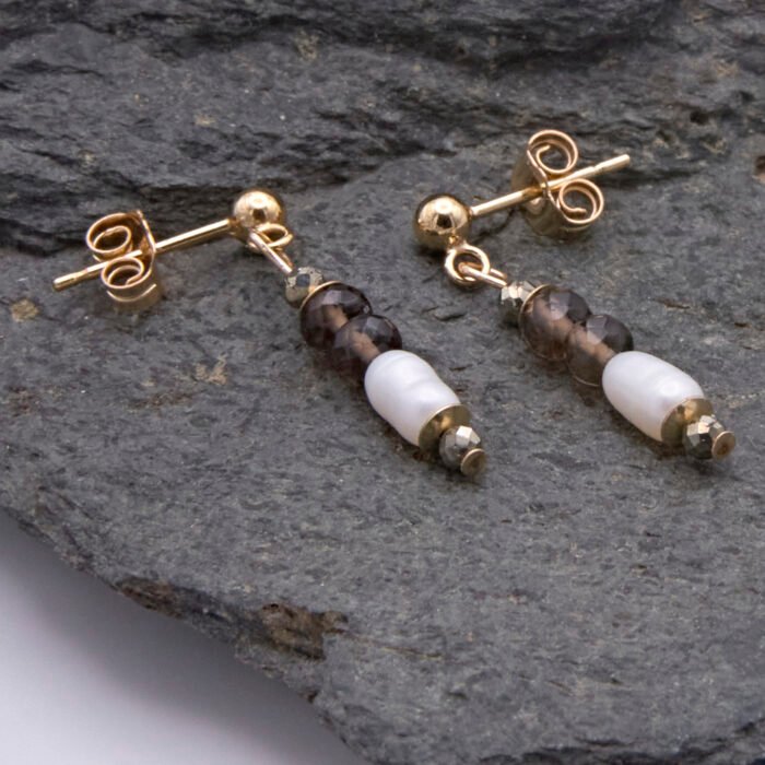 Smoky Quartz, Pyrite and Freshwater Rice Pearl Dangles on Gold Filled Ear Studs Smoky Quartz, Pyrite and Freshwater Rice Pearl Dangles on Gold Filled Ear Studs on dark grey stone