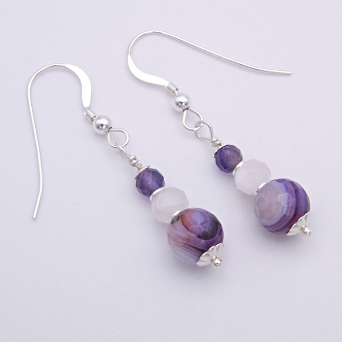 Purple Banded Agate, Rainbow Moonstone and Amethyst Sterling Silver Drop Earrings Purple Banded Agate, Rainbow Moonstone and Amethyst Sterling Silver Drop Earrings shown from above on plain white background
