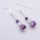 Purple Banded Agate, Rainbow Moonstone and Amethyst Sterling Silver Drop Earrings Purple Banded Agate, Rainbow Moonstone and Amethyst Sterling Silver Drop Earrings shown from above on plain white background