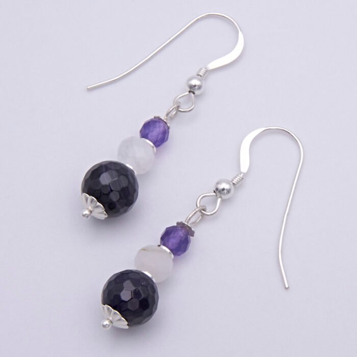 Amethyst, Rainbow Moonstone and Purple Banded Agate Stack Drop Sterling Silver Earrings shown on plain white surface, viewed from above