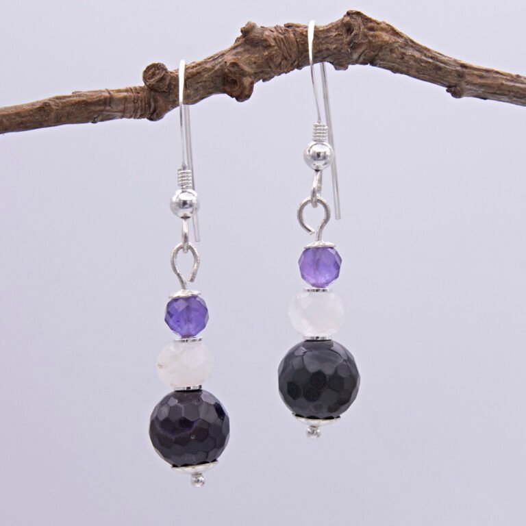 Amethyst, Rainbow Moonstone and Purple Banded Agate Stack Drop Sterling Silver Earrings shown hanging from twig