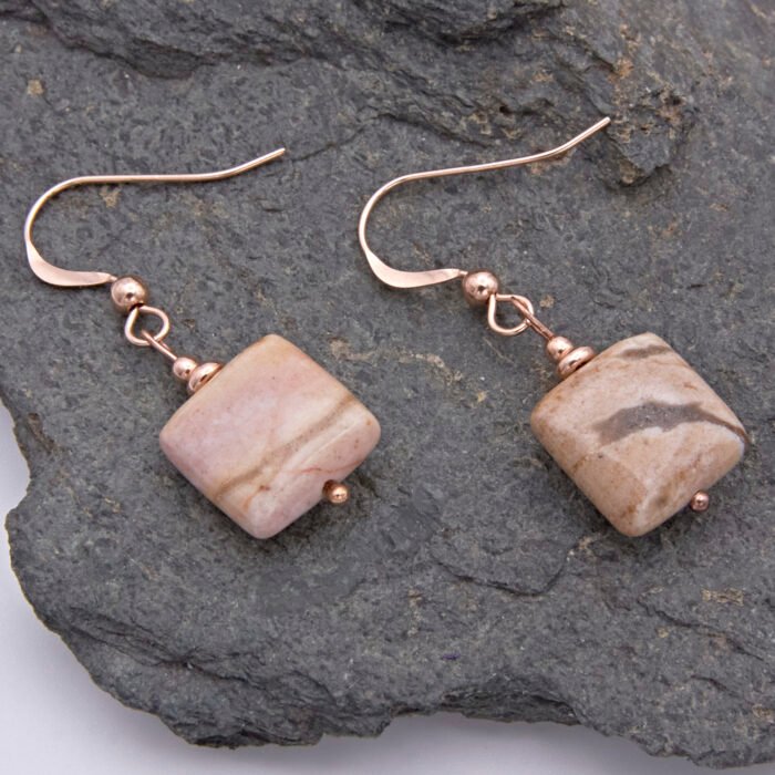 Zebra Jasper Rose Gold Filled Earrings showing other side of the Zebra Jasper stones, shown viewed from above on dark grey stone