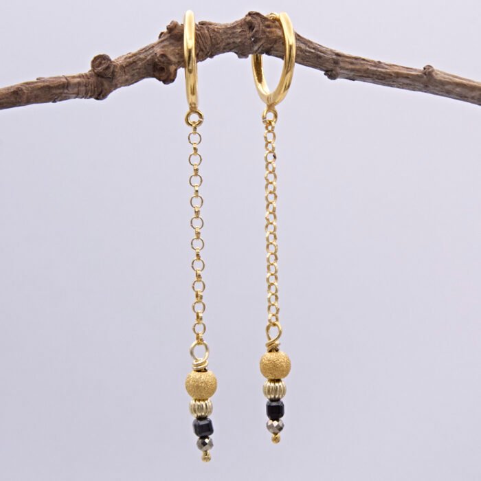 Black Spinel, Pyrite and Gold Vermeil Hinged Earhoop Dangles Black Spinel, Pyrite and Gold Vermeil Hinged Earhoop Dangles shown hanging from twig
